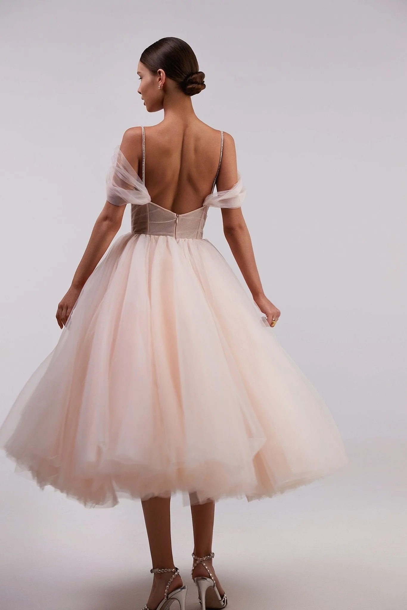 Feminine tulle cocktail dress with the light off-the-shoulder sleeves