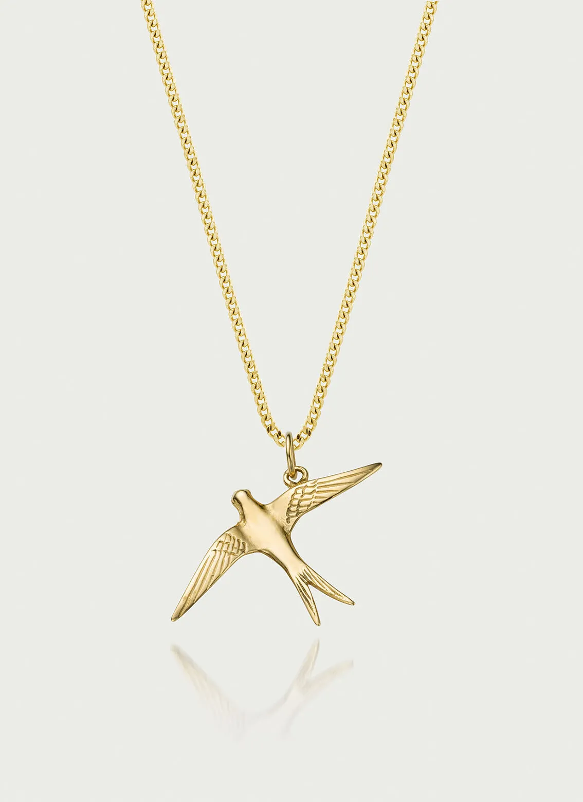 Swallow charm 14k gold