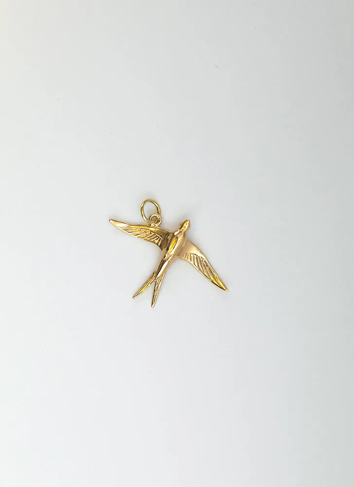 Swallow charm 14k gold